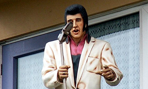 Fibreglass Elvis statue on balcony by gothman, Flickr Creative Commons.