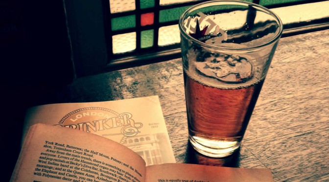 Beer and a book in an atmospheric pub.