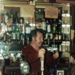 Bailey's Dad behind the bar. Flower's, Heineken, unused cask ale pump, Whitbread Tankard, Whitbread Best.