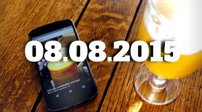 Smartphone with glass of beer.