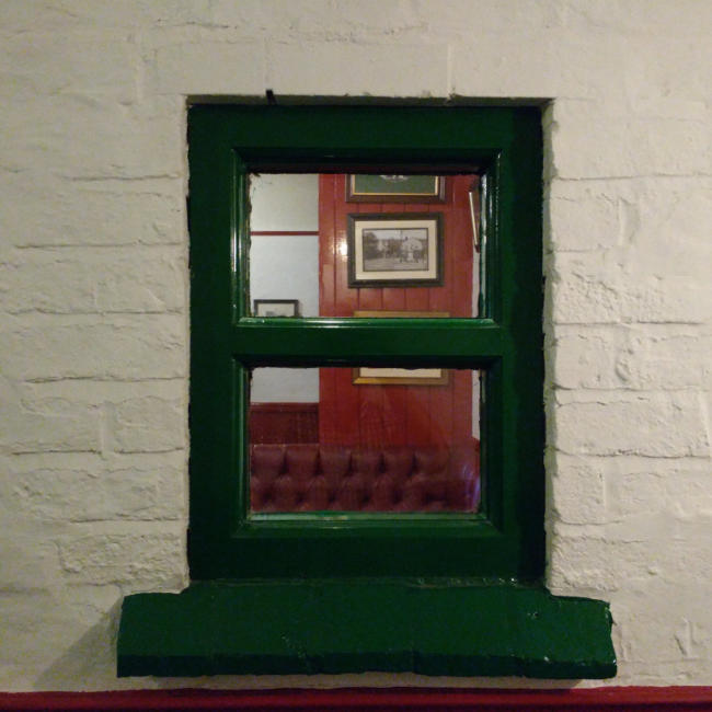 An interior window at the Old Swan.