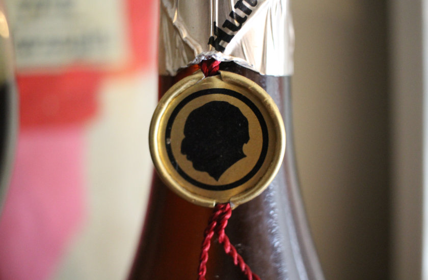 Thomas Hardy in profile on the neck of our 1986 beer bottle.