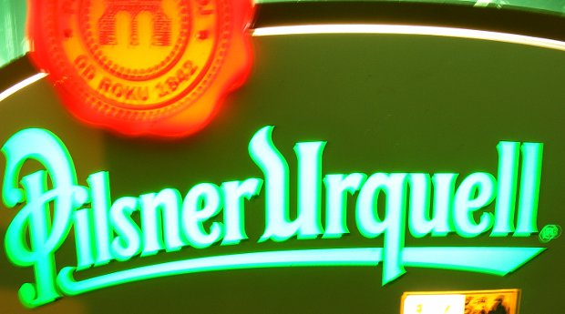 Illuminated Pilsner Urquell sign, Prague.