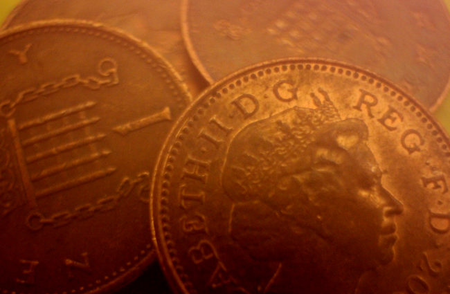Macro shot of 1p pieces with The Queen's profile.