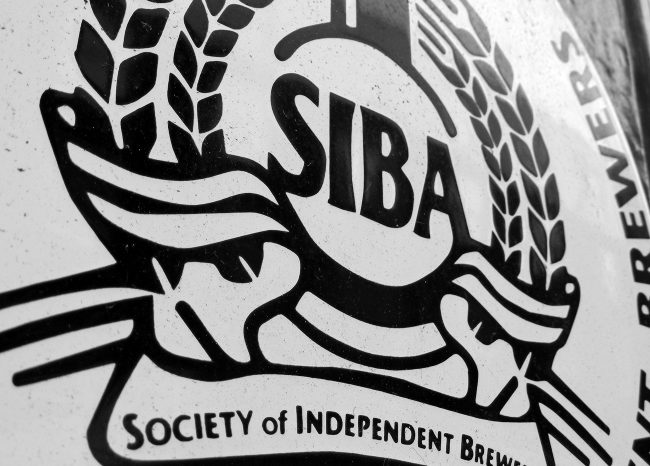 Vintage SIBA sign on a pub in London.