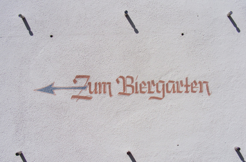 Sign on a wall: Zum Biergarten,