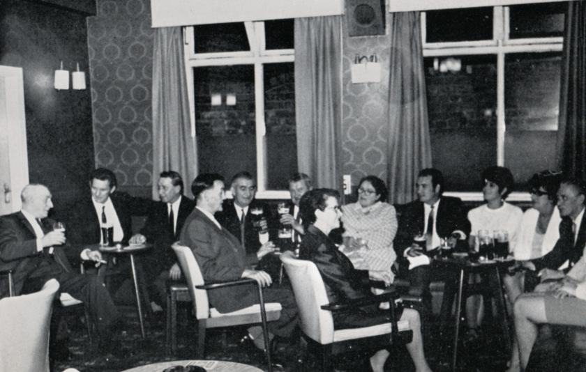 People drinking in a northern club.