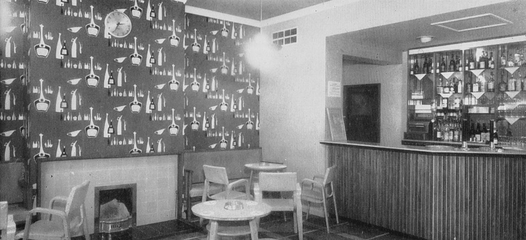 A view of the same bar with typically 1950s wallpaper.
