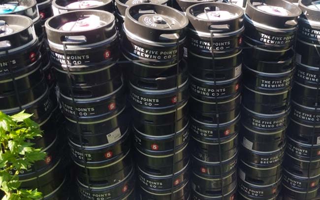 Five Points brewery kegs piled high