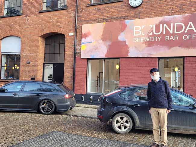 The Boundary brewery taproom in an old red brick building.