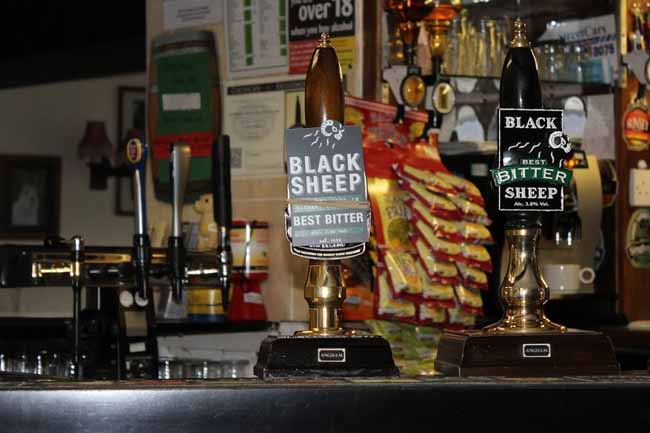 Black Sheep pump clips on the bar of a Yorkshire pub.