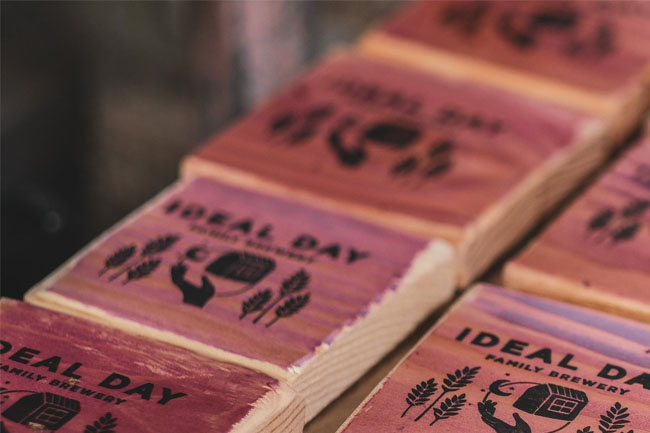 Handmade wooden labels for Ideal Day beer.